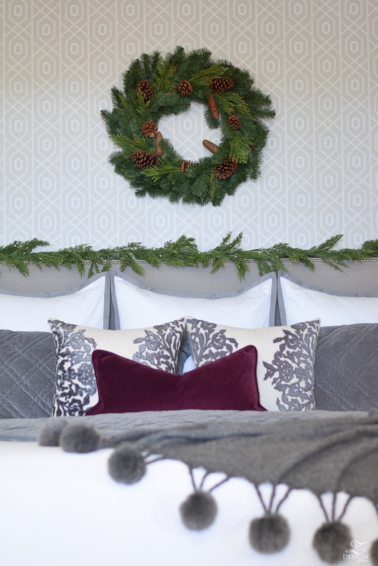 bedroom-christmas-home-tour-chirstmas-bedding-round-faceted-mirror-white-christmas-decor-flocked-tree-geometric-wallpaper-8