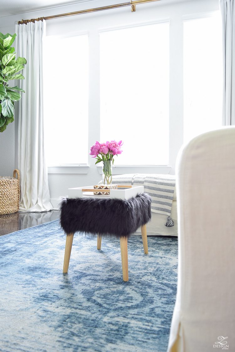 Summer living room tour black fur stool blue vintage inspried rug black and white tassel throw-7