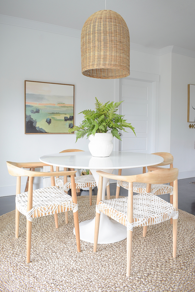 Zdesign At Home Spring Dining Room Tour - Boho chic design w/ basket pendant, tulip table, modern wooden chairs with leather seat