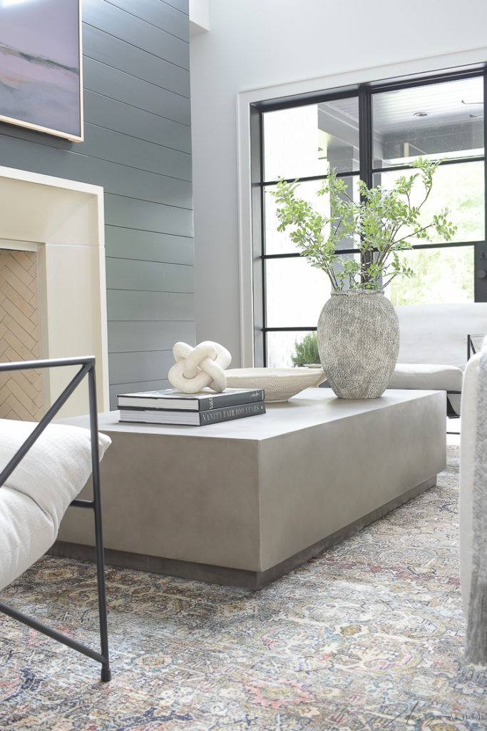 concrete coffee table with modern accessories