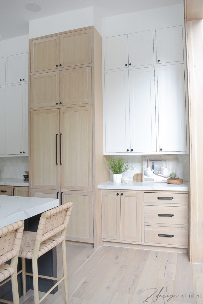 dacor panel ready fridge and white oak \ white painted cabinets in modern farmhouse kitchen