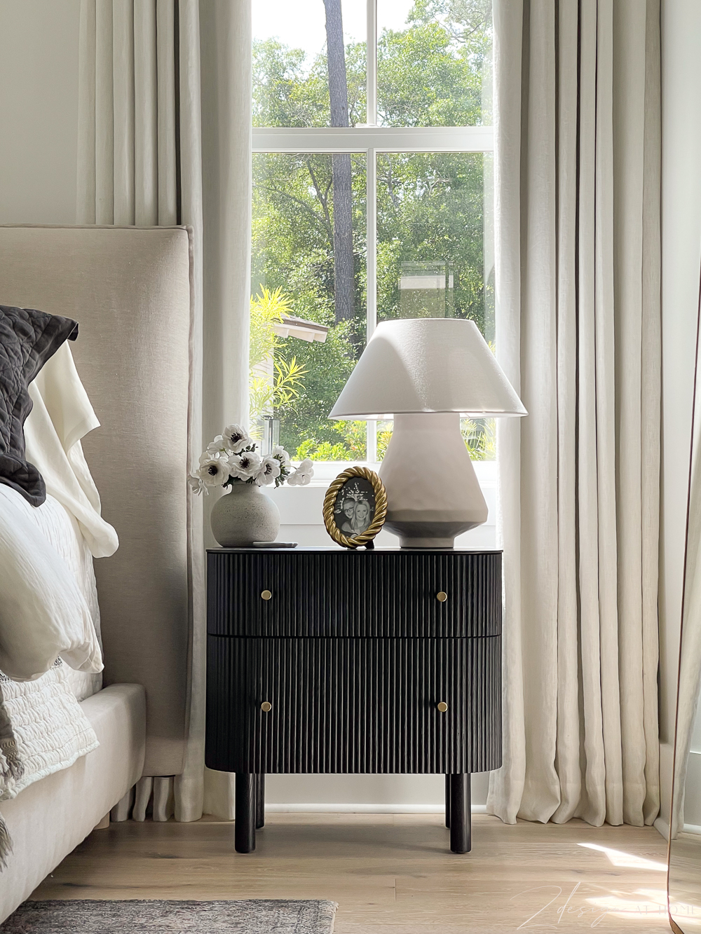 black reeded, fluted ribbed nightstand brass hardware in master bedroom 